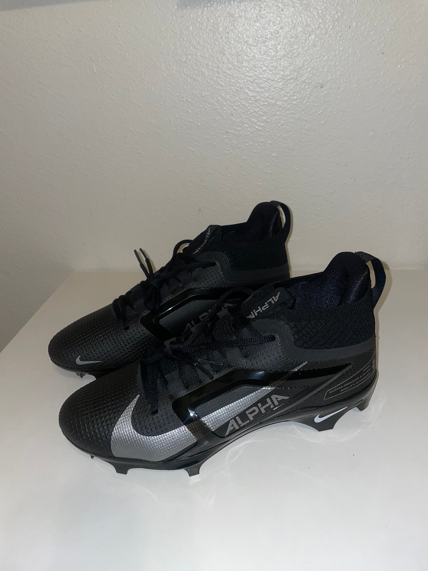 all black jordan football cleats