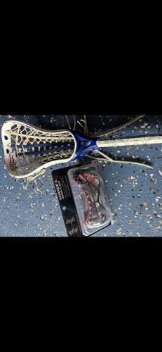 Girls lacrosse stick and goggles