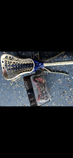Girls lacrosse stick and goggles