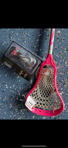 Girls lacrosse stick and goggles