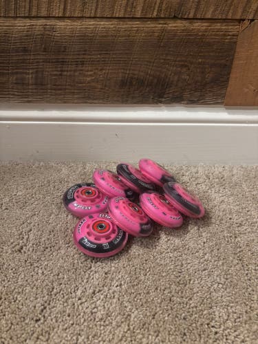 72/68mm Rinkrat XXX Split Pink/Black and Alkali Swiss Bearings