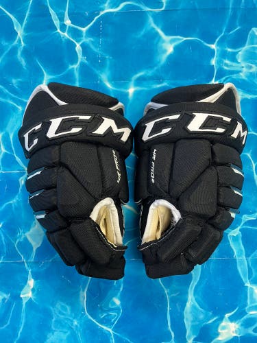 Black Junior CCM Tacks 4 Roll Pro 2 Gloves 12" (Used)