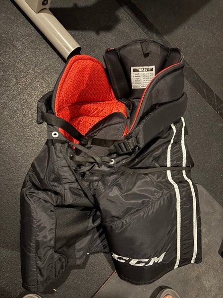TWO (black kings and black/red/white) Senior Medium CCM HP45 Pants Pro Stock (like new condition)