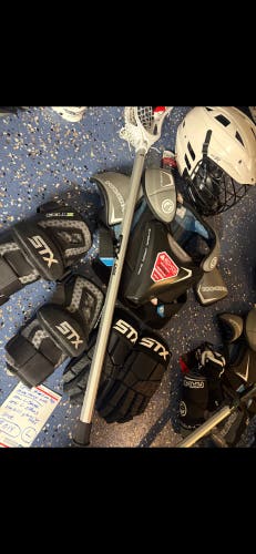 Lacrosse equipment set up . Meets nocsae lax gear