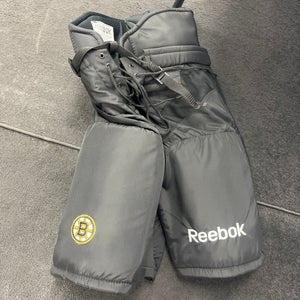 Boston Bruins senior small pro stock hockey pants.