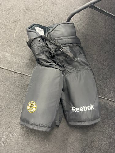 Boston Bruins senior small pro stock hockey pants.