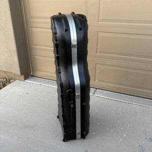 SKG hard cased wheeled Travel Cover (Used)