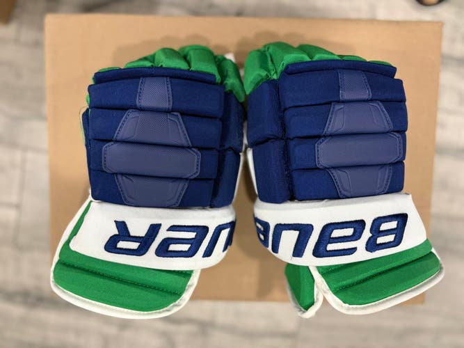 Bauer Nexus 2N - game Used NHL Pro Stock hockey Glove - Jordan Staal (Blue/Green/White) Carolina