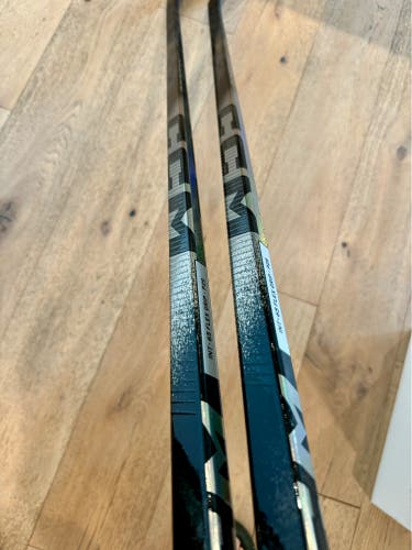 Two CCM Ribcor Trigger 10 Pros, Intermediate, P29, Left, 65 Flex, Charcoal (New)