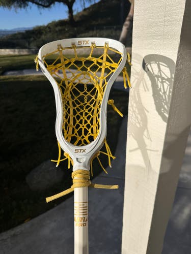 STX Aria Pro Complete Stick Woman LAX white and yellow string.