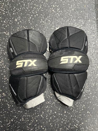 Used STX SURGEON 400 Lacrosse Arm Pads/Guards Black MD 11849-S000034692