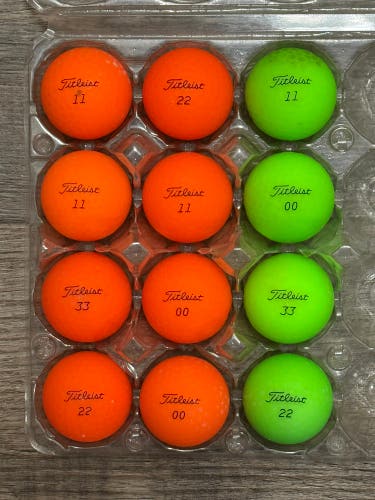 12 Titleist Velocity Orange and Green Golf Balls - 5A/4A Condition