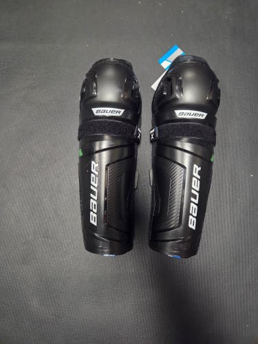 Brand New Junior 11" Bauer X Shin Pads