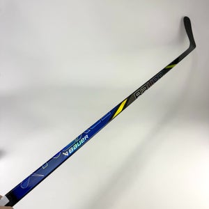 New Left Blue/Yellow Bauer Nexus Tracer | 82 Flex Oates Pro Curve Grip | Schenn | J506