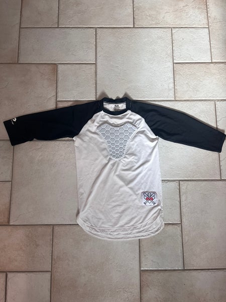 McDavid youth large padded compression long sleeve.