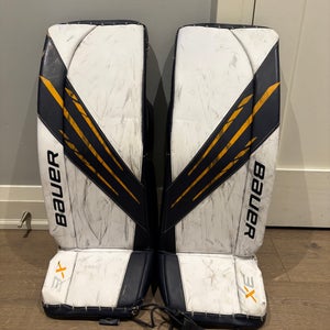 Medium Bauer Vapor 3X Goalie Leg Pads (Used) - White, Blue and Sport Gold