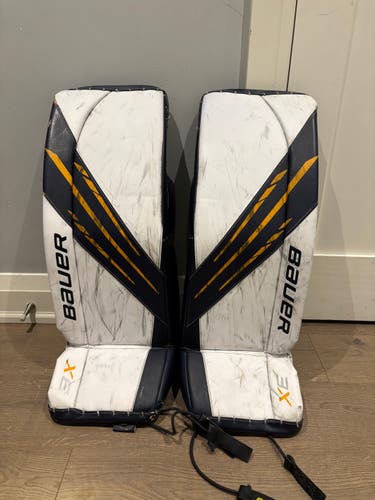 Medium Bauer Vapor 3X Goalie Leg Pads (Used) - White, Blue and Sport Gold