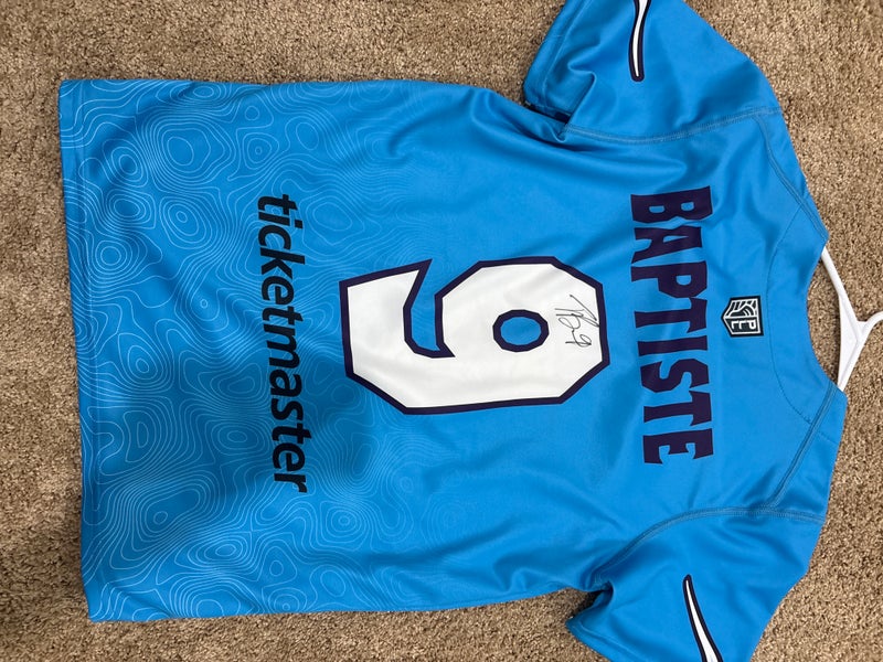 TREVOR BAPTISTE #9 HAND SIGNED ATLAS JERSEY