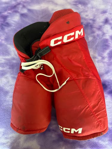 Red Junior Medium CCM Next Hockey Pants (Used)
