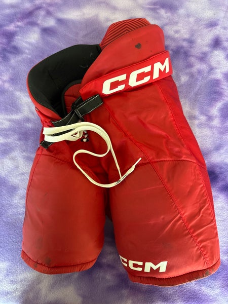 Red Junior Medium CCM Next Hockey Pants (Used)