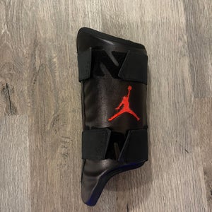 Black and Red Jordan Leg Guard RHH Adult