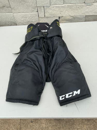 Black Junior Medium CCM Ultra Tacks Hockey Pants (Used)