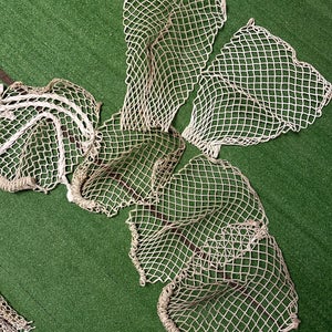 Used goalie mesh