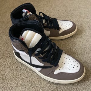 Authentic Travis Scott x Air Jordan 1 Retro High OG “Mocha.”
One of the most iconic and sought-after
