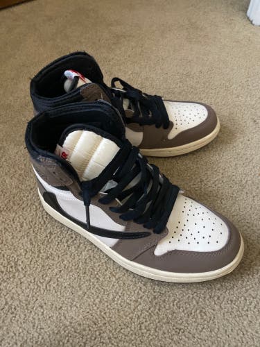 Authentic Travis Scott x Air Jordan 1 Retro High OG “Mocha.”
One of the most iconic and sought-after