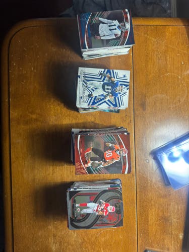 300-500 bulk NFL trading cards (2024 select and absolute, Don Russ, Phoenix, Rookies and stars, etc.
