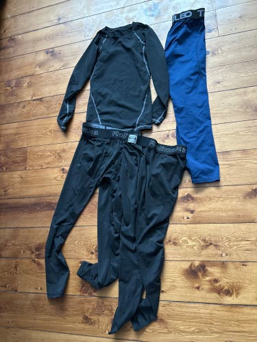 Black youth Medium black and blue compression shirt and three pairs of pants