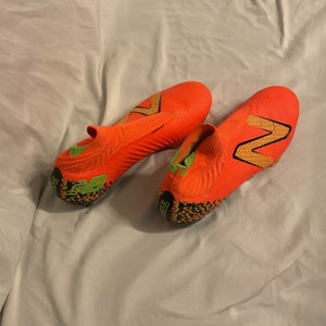 Boys cleats. Orange size 6Y (Big Kids / Youth) New Balance Tekela Molded Cleats Cleats (Used)