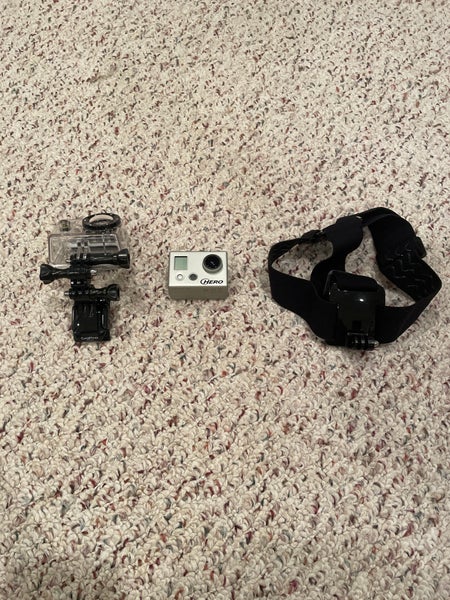 GoPro Hero with Case and Helmet Attachment