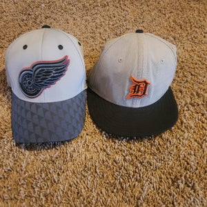 Detroit Redwings Reebok S/M Fitted Hat. Detroit Pistons 6 7/8 59FIFTY Fitted Hat. Nice Hats