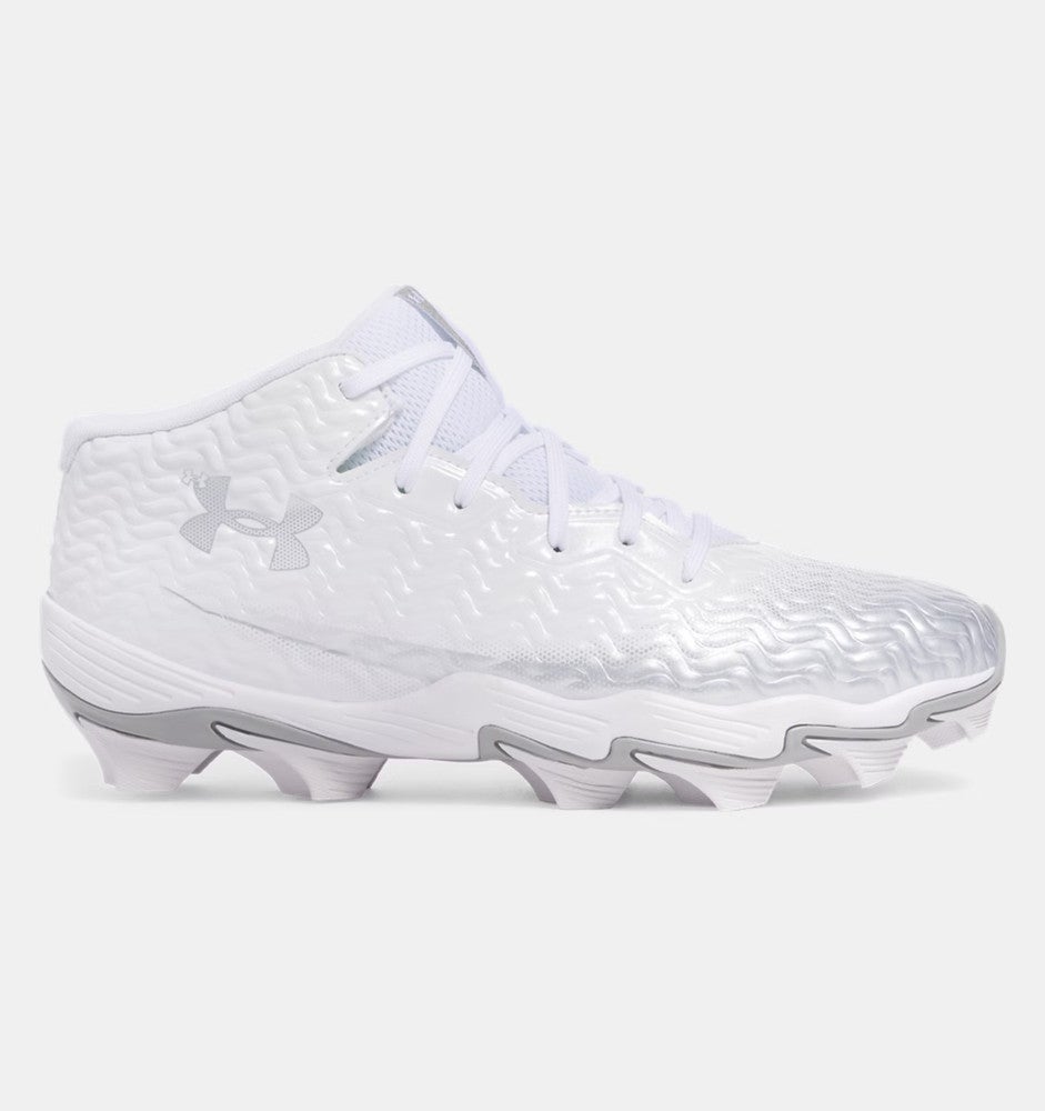 all white low top under armour cleats