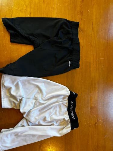Black (Addidas) and White (Easton) Medium/Large Compression Shorts (Used)