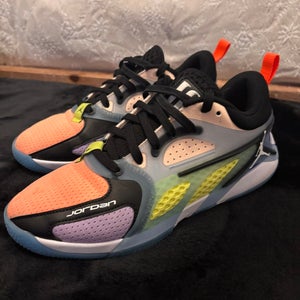 Jordan Heir PF "Her Collective" women's basketball shoe in the Black/Crimson Tint/Peach Cream color