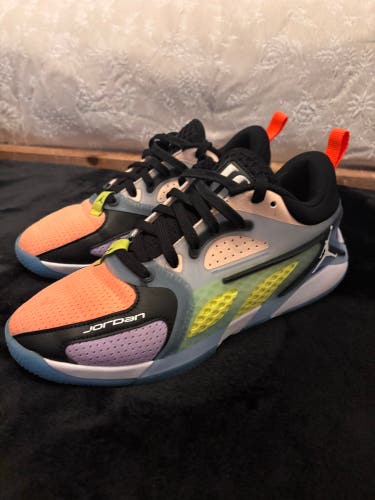 Jordan Heir PF "Her Collective" women's basketball shoe in the Black/Crimson Tint/Peach Cream color