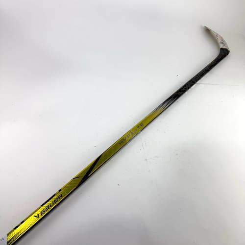 Repaired Right Handed Yellow Bauer Hyperlite 2 | Laine Curve - 77 Flex - Grip - #J375