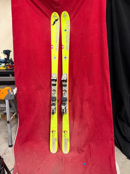 Skis: Blizzard Titan Nine skis, 181cm. Bindings: marker, binding