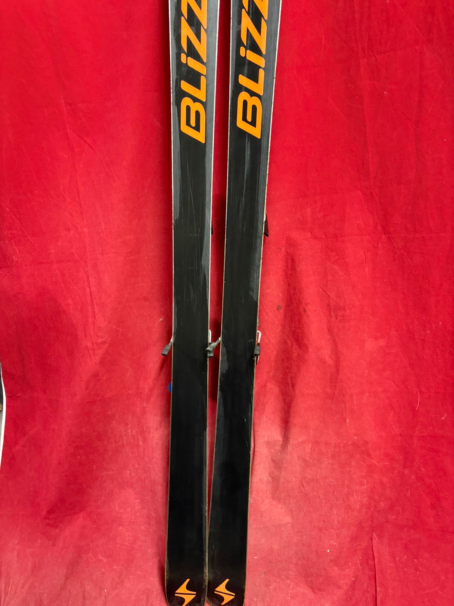 Skis: Blizzard Titan Nine skis, 181cm. Bindings: marker, binding