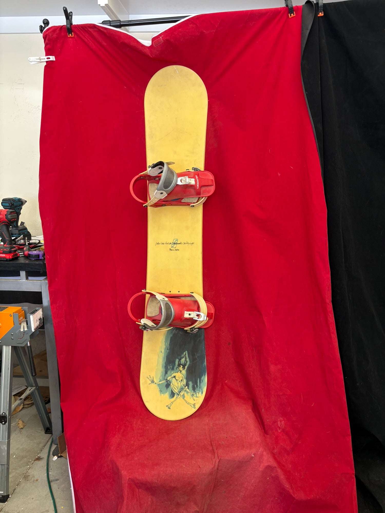 Snowboard: Peter Line Forum snowboard, 158cm. Bindings: Burton L