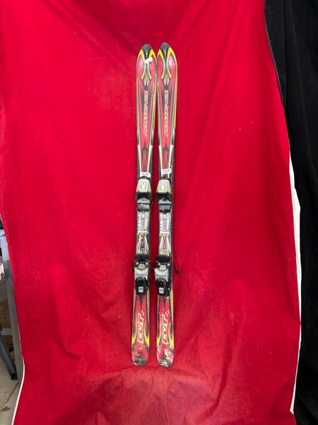 Skis: Rossignol Cut 10.4 skis, 140. Bindings: Marker, binding Range: 265-328mm