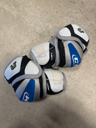 CCM U+ Fit 09 Elbow Pads, Size Junior Medium