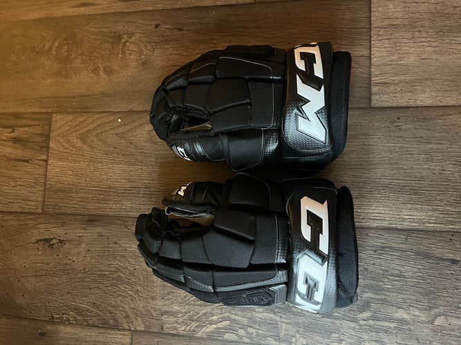 CCM U+ 08 Gloves 14" (Used)