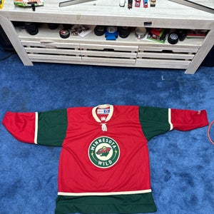 Minnesota Wild jersey and puck