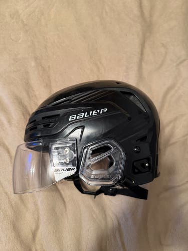 Large Bauer Re-Akt 85 Helmet (Used) with Bauer Pro-Clip Visor.