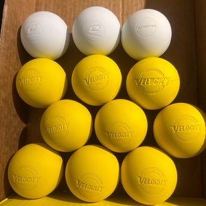 12 Pack Lacrosse Balls (9 yellow Velocities, 3 white Champro) 1 used