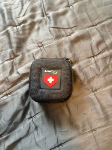 Arm care device with case, straps, and device