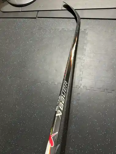 Intermediate Bauer Hockey Stick Mid Pattern 65 Flex Pro Stock (Used)